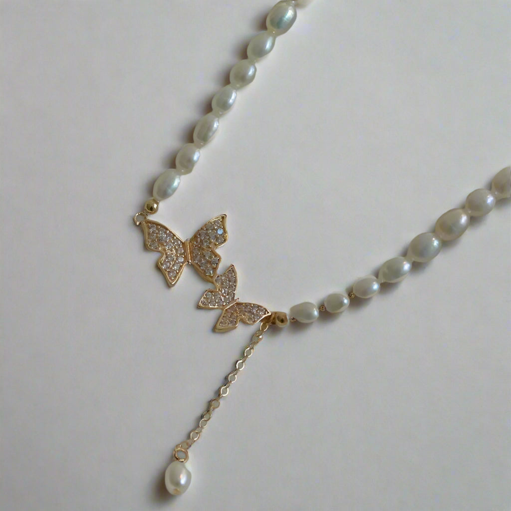 Butterfly chain pearl necklace